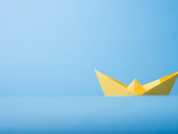 yellow origami boat